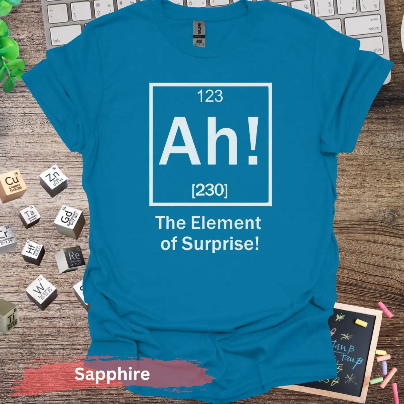 Ah! The Element of Surprise T-Shirt - S / Sapphire - Physical Item