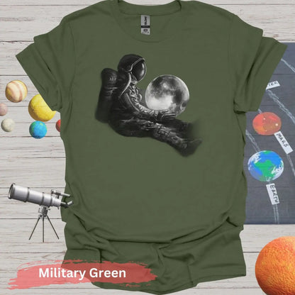 Dreamy Astronaut with Moon | Cosmic Serenity Art Shirt - S / Military Green - Physical Item