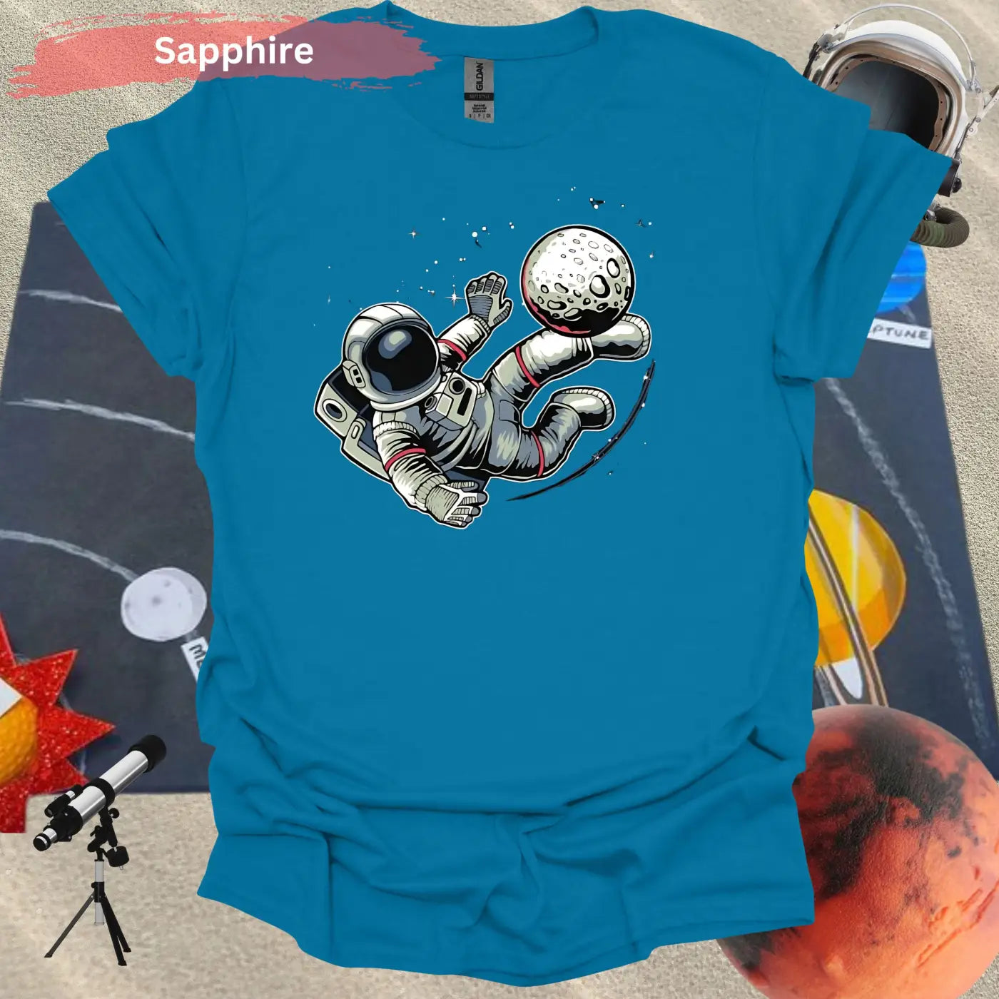 Astronaut Kicking Moon T-shirt - S / Sapphire - Physical Item