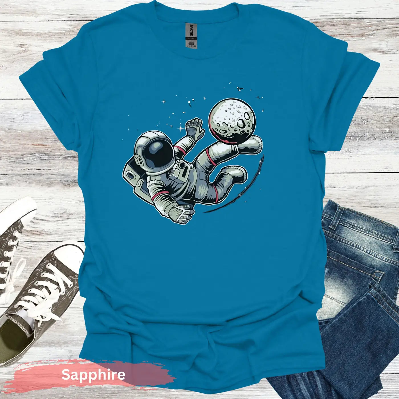 Astronaut Kicking Moon T-shirt - S / Sapphire - Physical Item