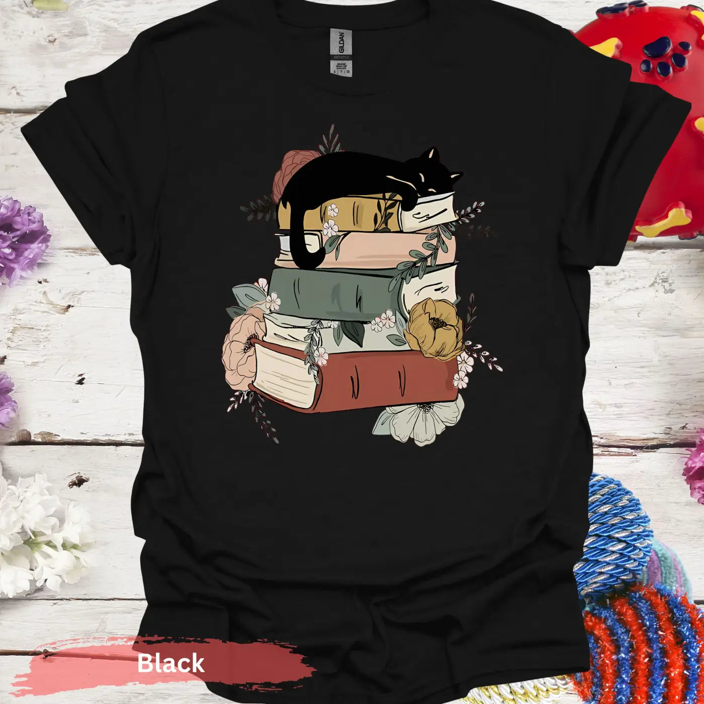 Cat Sleeping on Books and Flowers T-Shirt - S / Black - Physical Item