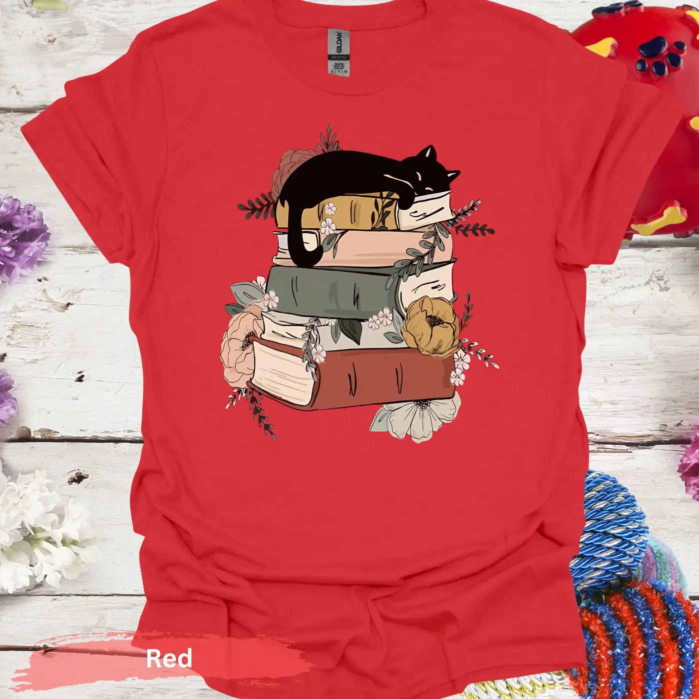 Cat Sleeping on Books and Flowers T-Shirt - S / Red - Physical Item