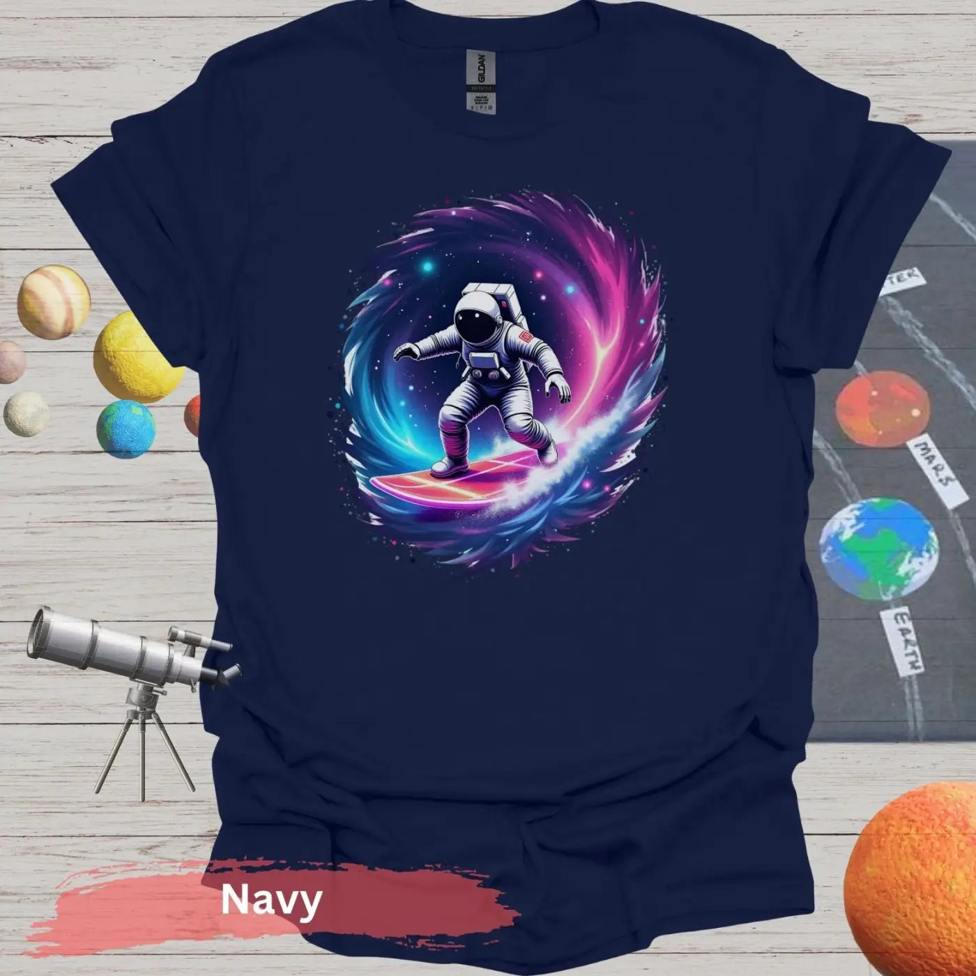 Cosmic Wave Rider – Astronaut Surfing Space Design T-shirt - S / Navy - Physical Item