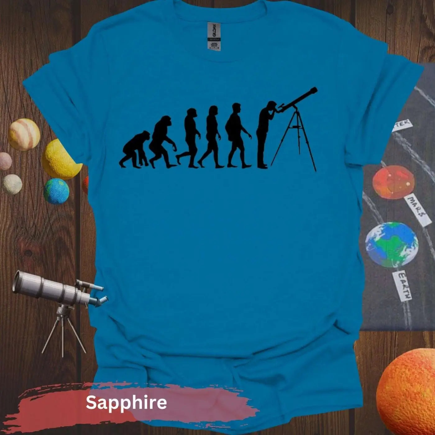 Evolution of Curiosity T-Shirt – From Ape to Stargazer - S / Sapphire - Physical Item