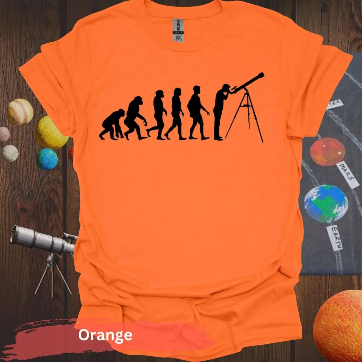 Evolution of Curiosity T-Shirt – From Ape to Stargazer - S / Orange - Physical Item