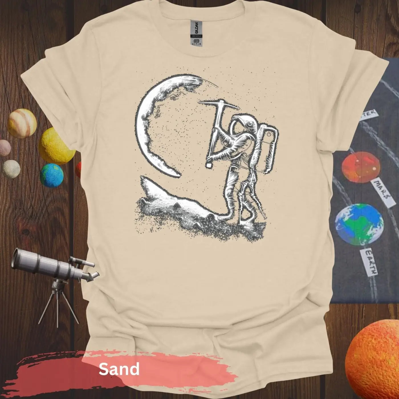 Lunar Miner: Astronaut Moon Chiseling T-Shirt - S - Unisex / Sand - Physical Item