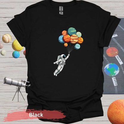 Planetary Dreams: Whimsical Astronaut Balloon T-Shirt - S / Black - Physical Item