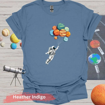 Planetary Dreams: Whimsical Astronaut Balloon T-Shirt - S / Heather Indigo - Physical Item