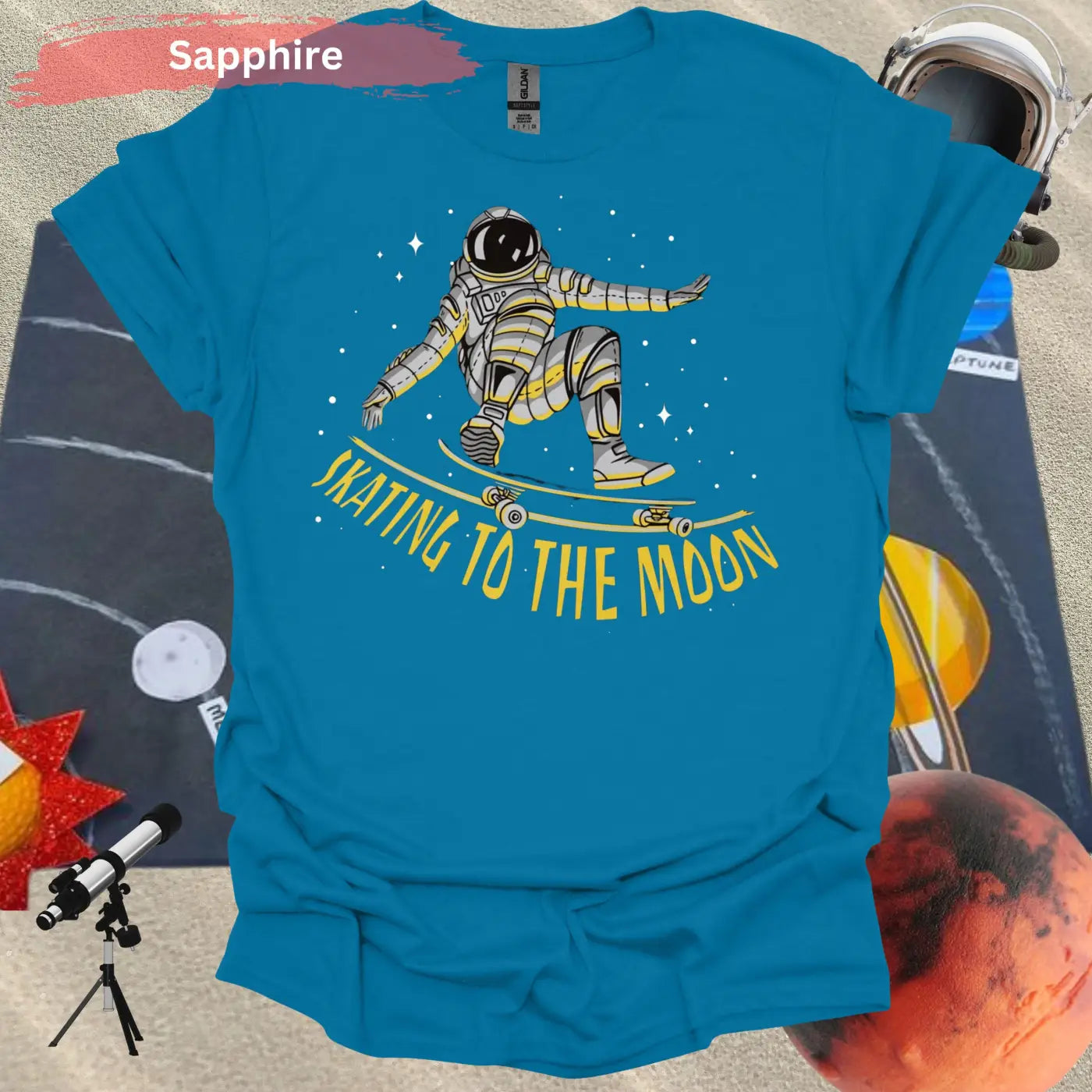 Skating to the Moon: Dynamic Astronaut T-Shirt - S / Sapphire - Physical Item