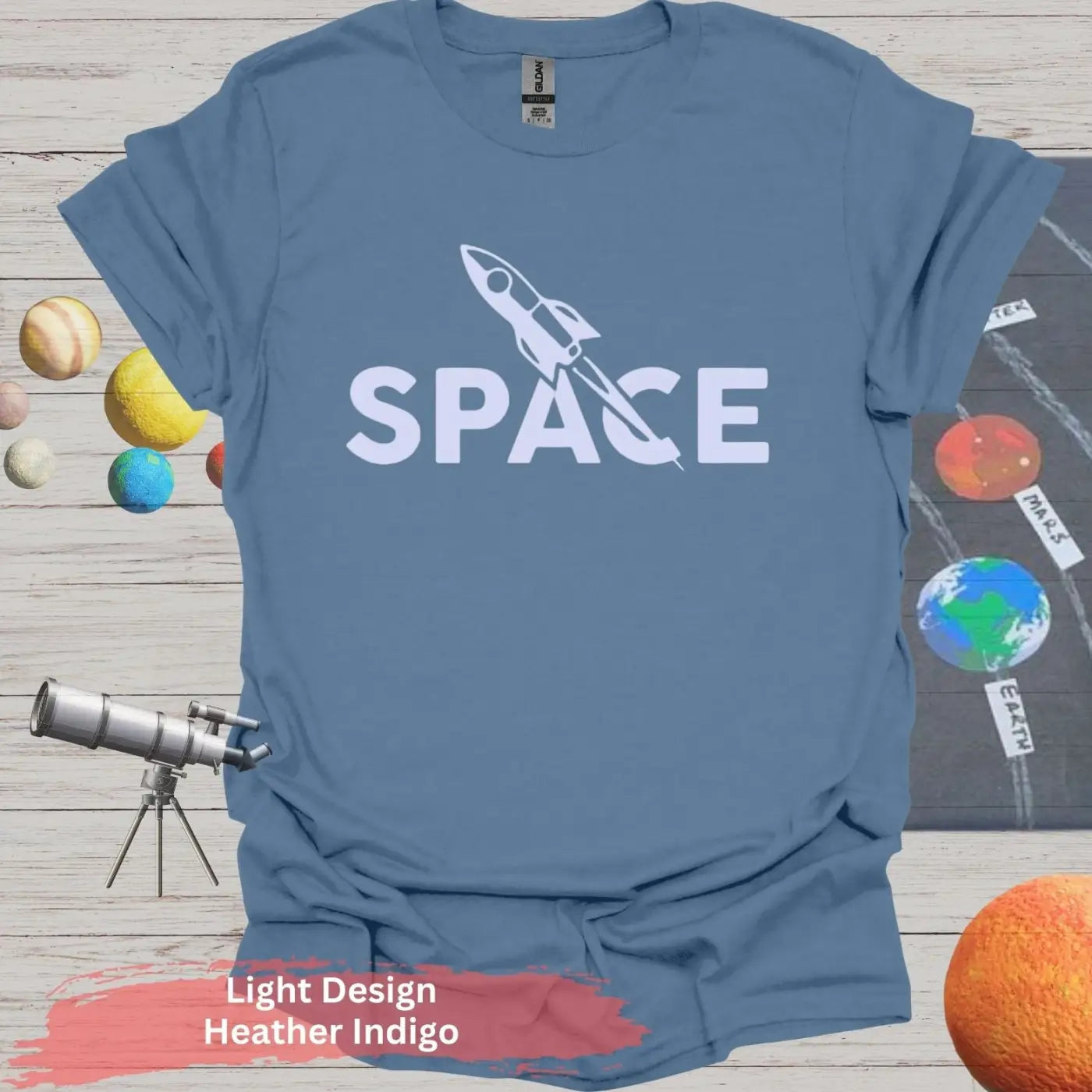 Minimalist Space Rocket T-Shirt – A Clean Launch of Style - S / Heather Indigo - Physical Item