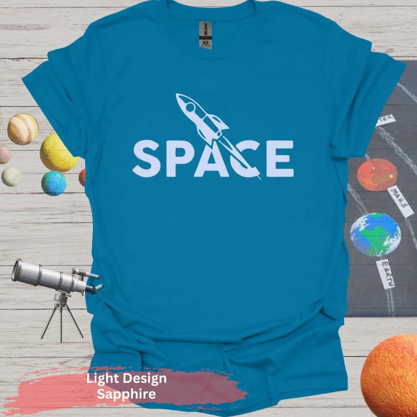 Minimalist Space Rocket T-Shirt – A Clean Launch of Style - S / Sapphire - Physical Item